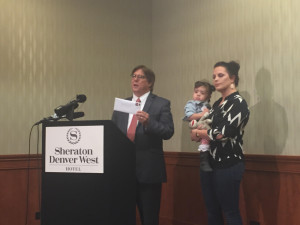 Jeffco board president Ken Witt shows the envelope he was mailing his complaint in to members of the media on Thursday. Next to him are his daughter and granddaughter Danielle and Peyton Lopez. 