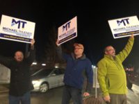 Michael Thuener, left, waves signs asking motorists to vote for him at 11th Ave and U.S. Hwy 34 in Greeley on Monday. Rep. Steve Humphrey, Eaton (middle) and Rep. Hugh McKean, Loveland came out to support Thuener.