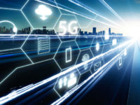 5G network wireless systems and internet of things with  highway overpass motion blur with city skyline background .