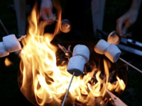 Toasting marshmallows for S'mores